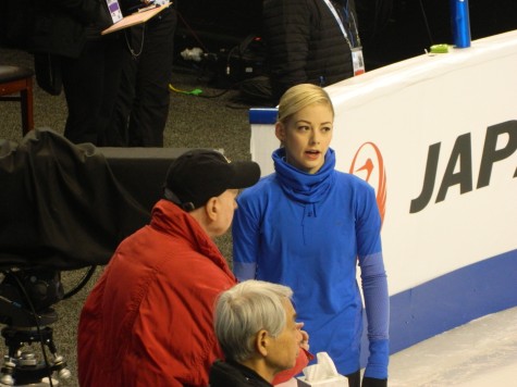 US national champion Gracie Gold talks with coach Frank Carroll during the first day of practice for the 2016 World Figure Skating Championships at TD Garden in Boston on Monday, March 28. 