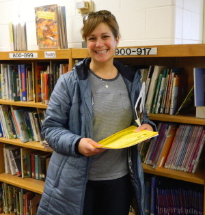 Elaina Griffith of the Watertown Education Foundation and one of the organizers of the fifth annual Spelling Bee for Watertown public school students, poses during her visit to the Cunniff Kids News newsroom on Jan. 13, 2015.