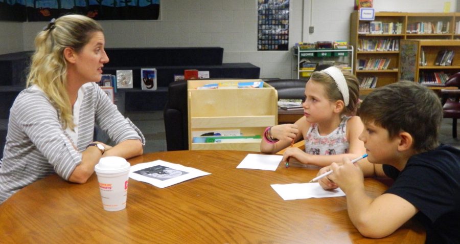 Lee Haley of the Cunniff School PTO (left) talks with Cunniff Kids News reporters about the annual Cunniff Halloween party Oct. 28, 2016.