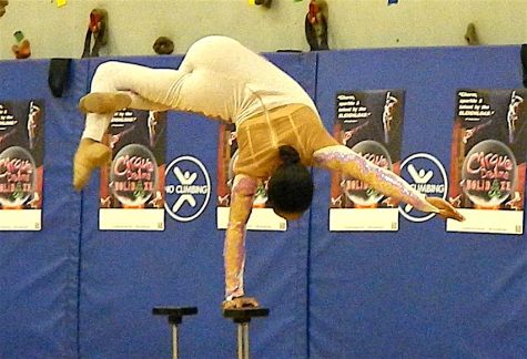 Shenea Booth, hand balancer from Cirque Dreams Holidaze, performed for students during her visit to Lowell Elementary School in Watertown, Mass., on Friday, Nov. 18, 2016. 