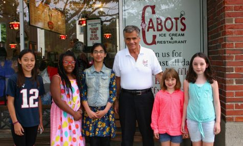 Joe Prestejohn (third from right) poses with reporters from the Cunniff Kids News outside of Cabots Ice Cream in Newton, Mass., on June 30, 2017.