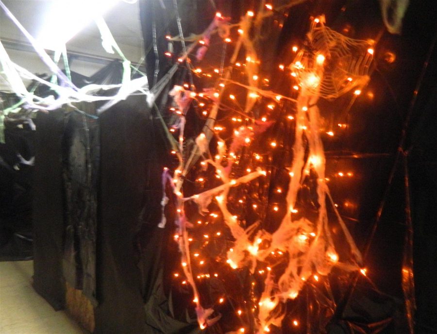 Lights and spiderwebs hang in the basement of Cunniff Elementary School in preparation for visitors to the Haunted House during the annual Halloween Party on Friday, Oct. 27, 2017, from 6-8 p.m.
