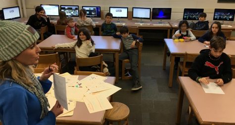 Amy Donohue talks with reporters from the Cunniff Kids News about the eighth annual Watertown Spelling Bee, which will be held Sunday, Jan. 28, 2018, at Watertown Middle School.